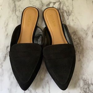 She&in black mules